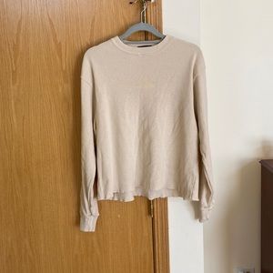 Very soft and slouchy crean long sleeve.